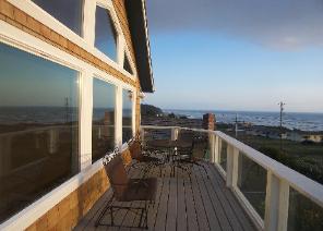 Wide upper deck with ocean and beach view at Bob's Pacific Beach House